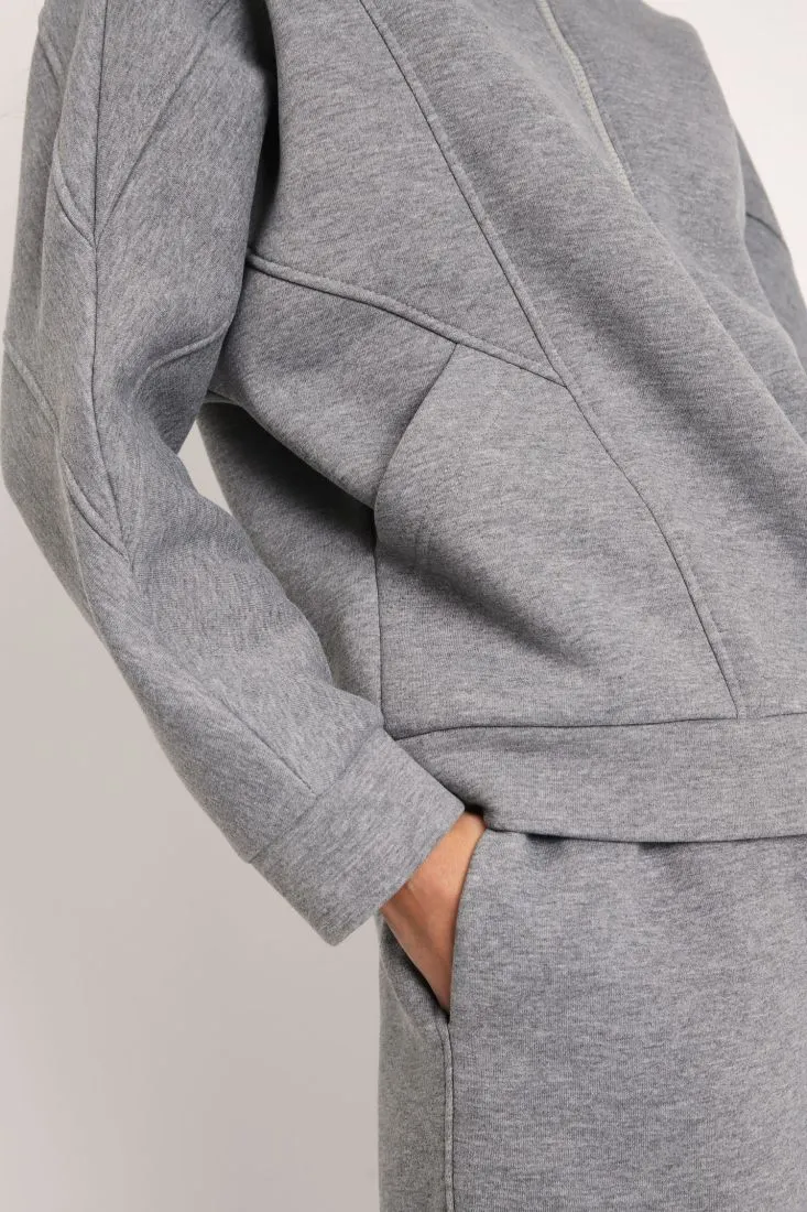 Felpa oversize monocolour con collo alto e zip