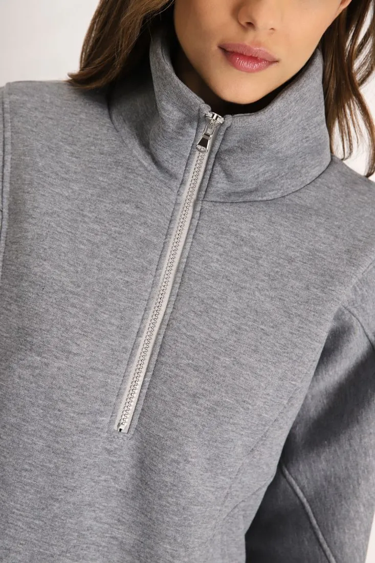 Felpa oversize monocolour con collo alto e zip