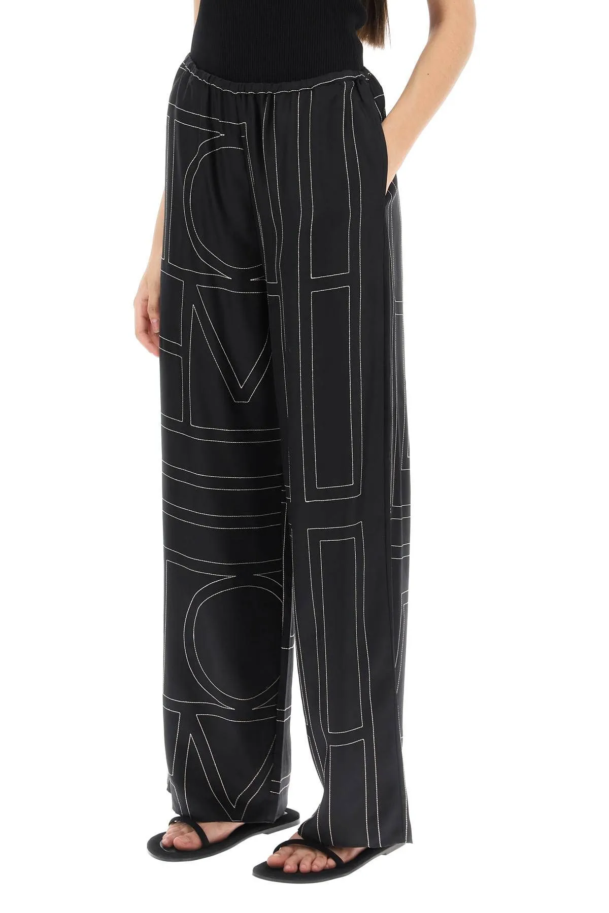Pantaloni in seta ricamo monogram