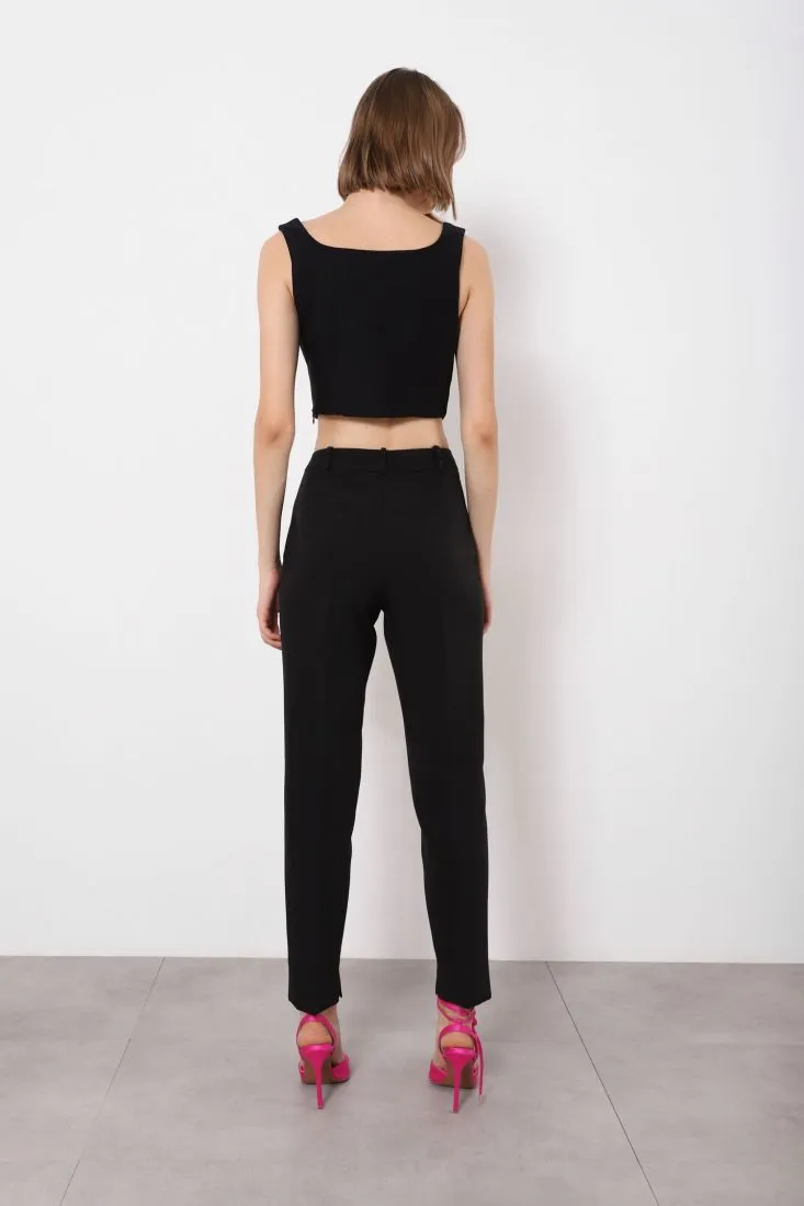 Pantaloni slim-fit con piega stirata