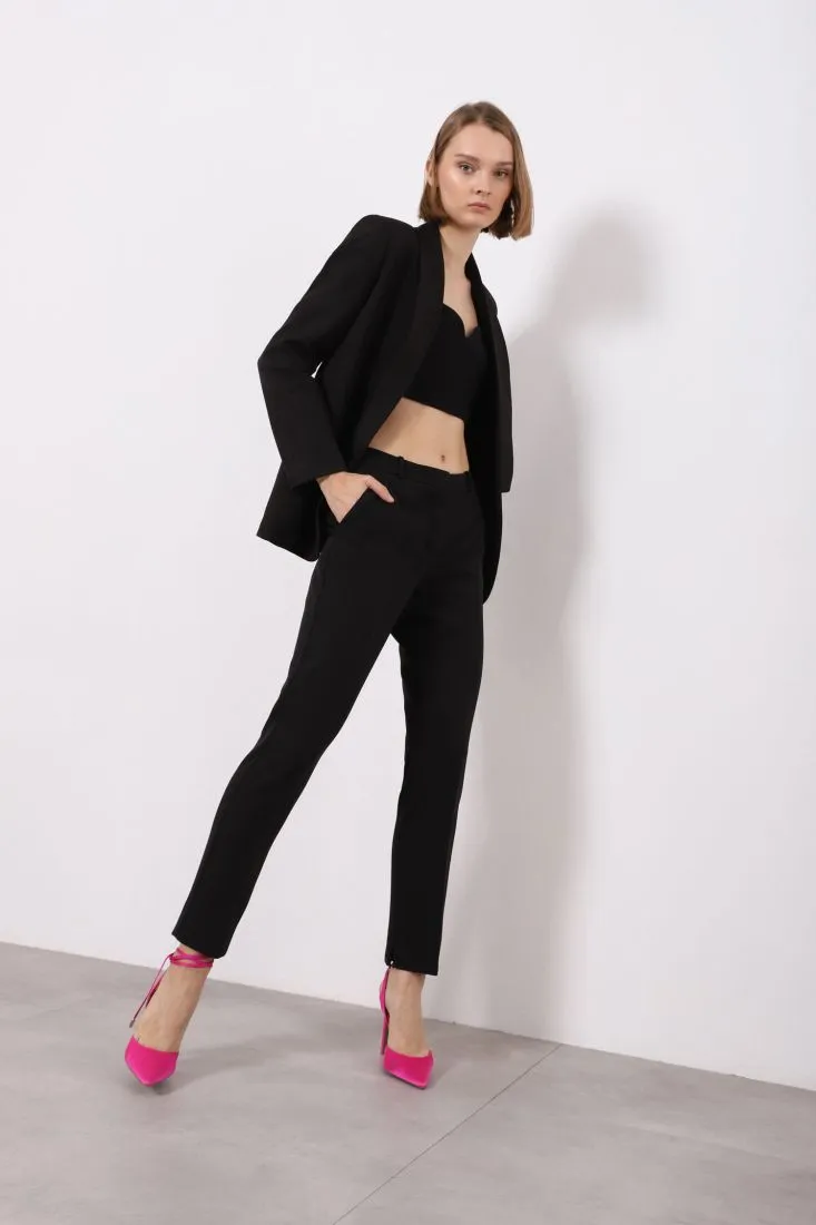 Pantaloni slim-fit con piega stirata