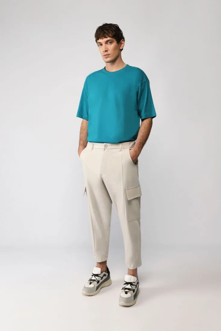 Pantaloni slim-fit monocolour con tasche laterali applicate