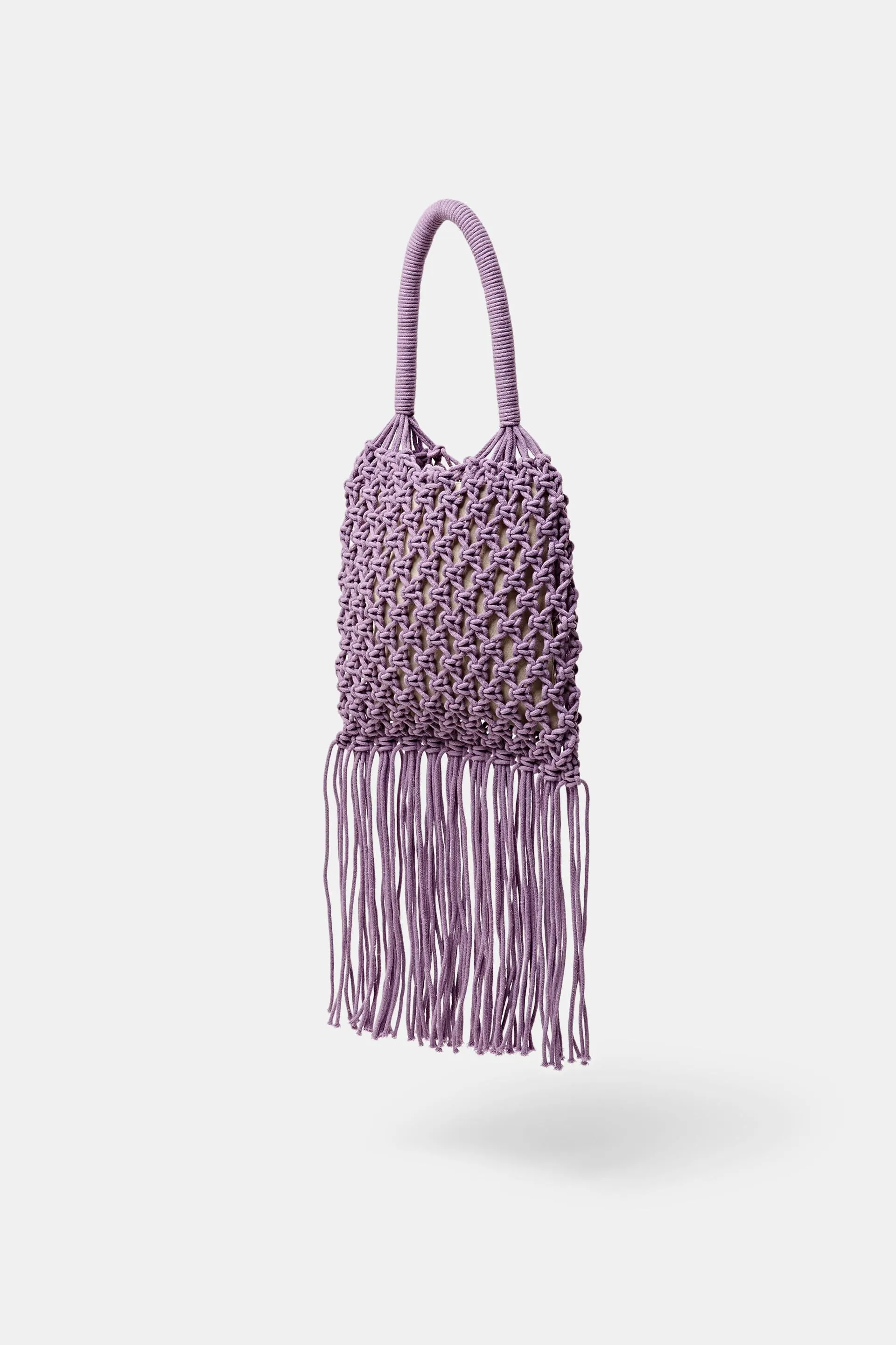 Tote bag a uncinetto a righe con nappe