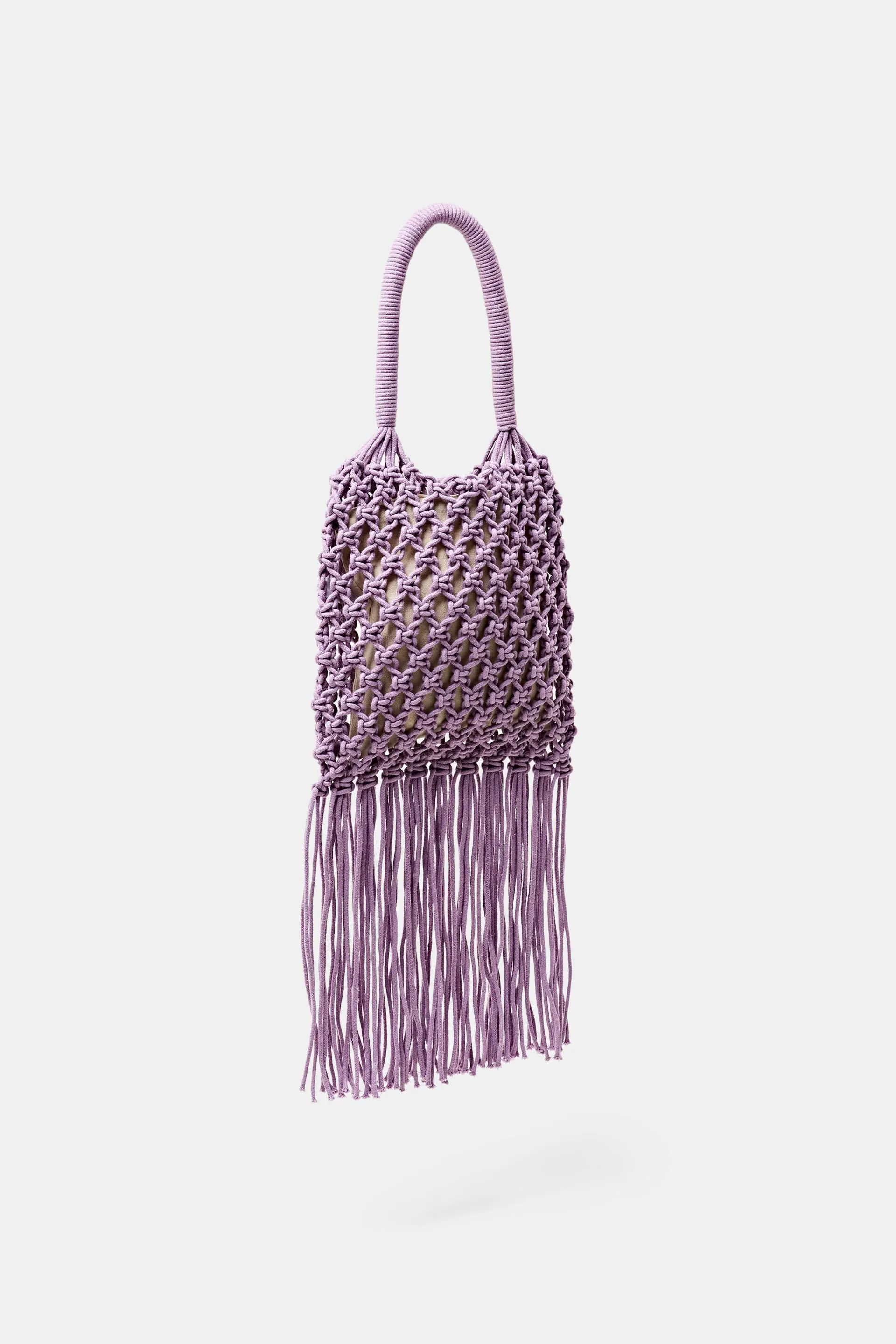 Tote bag a uncinetto a righe con nappe