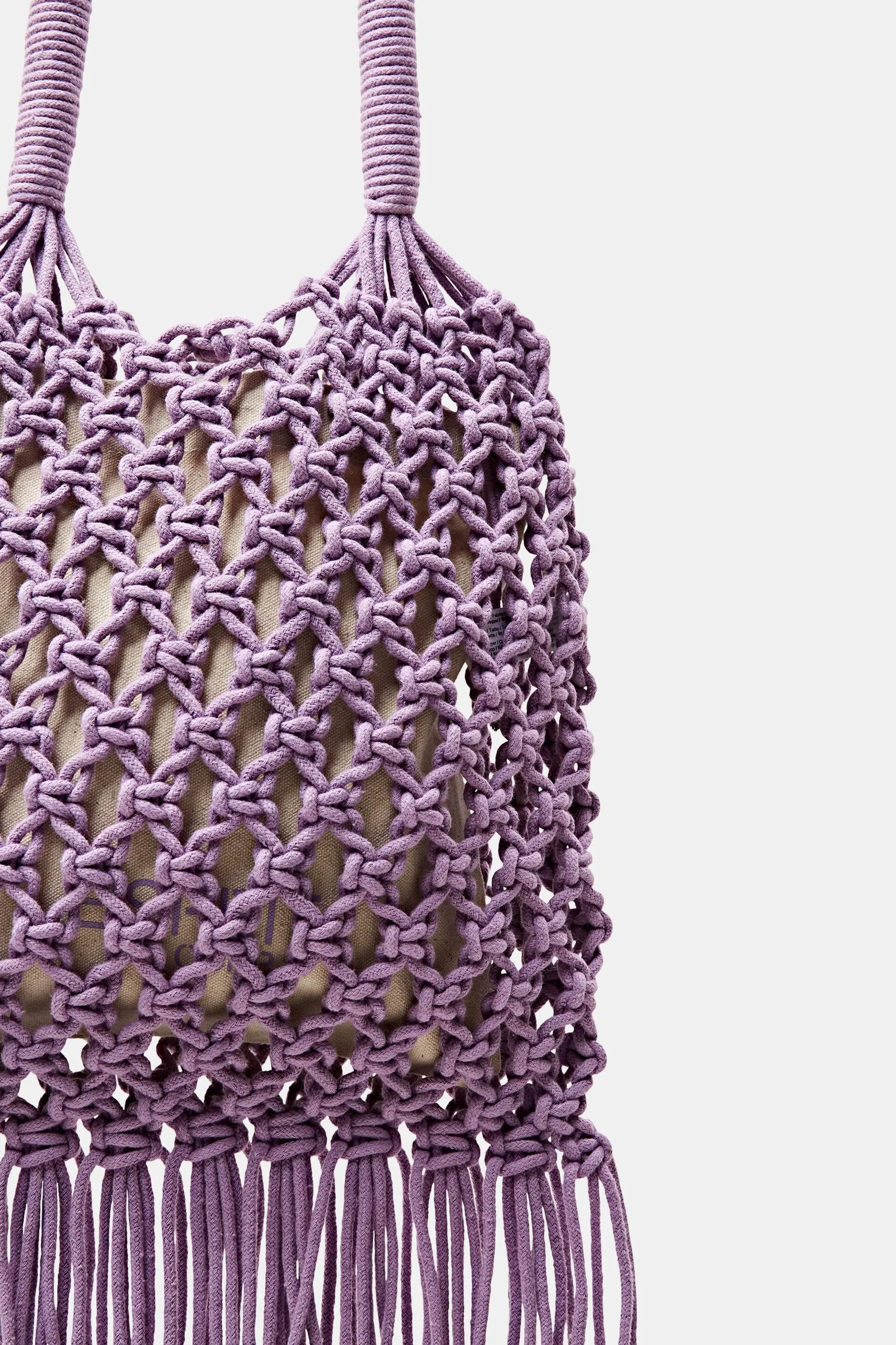 Tote bag a uncinetto a righe con nappe